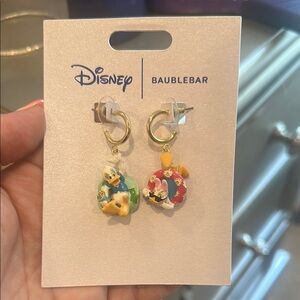 Brand new Disney Baublebar daisy and Donald pool float earrings